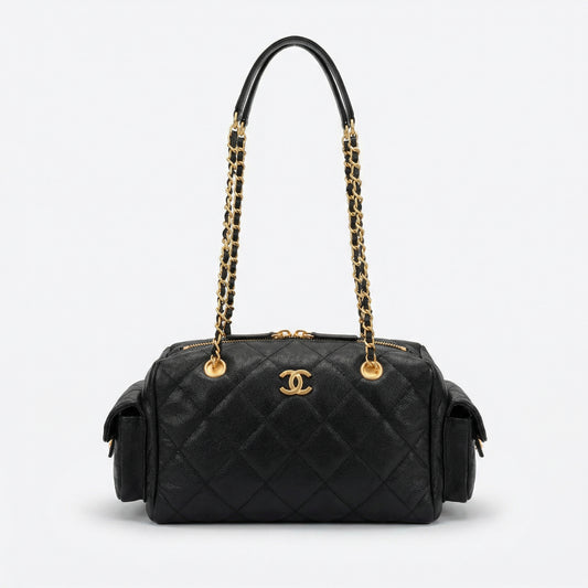 CHANEL - Sac Bowling en Cuir Grainé Matelassé